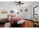 Cozy bedroom with terracotta floors and colorful bedding at 8255 E Vista De Valle --, Scottsdale, AZ 85255