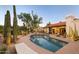 Inviting pool area with spacious patio and desert landscaping at 8255 E Vista De Valle --, Scottsdale, AZ 85255