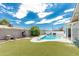 Spacious backyard with a kidney-shaped pool at 8631 E Jackrabbit Rd, Scottsdale, AZ 85250