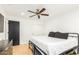 Spacious bedroom with ceiling fan and large bed at 8631 E Jackrabbit Rd, Scottsdale, AZ 85250