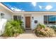 Modern front door entrance with updated light fixtures at 8631 E Jackrabbit Rd, Scottsdale, AZ 85250