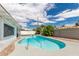 Refreshing kidney-shaped pool in sunny backyard at 8631 E Jackrabbit Rd, Scottsdale, AZ 85250