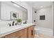 Bathroom with double vanity, bathtub and modern shower at 8779 E Vía De Sereno --, Scottsdale, AZ 85258