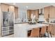 Modern kitchen with stainless steel appliances and light wood cabinets at 8779 E Vía De Sereno --, Scottsdale, AZ 85258