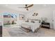 Spacious main bedroom with plush bedding and private access to backyard at 8779 E Vía De Sereno --, Scottsdale, AZ 85258