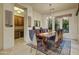 Formal dining room with a large table and chandelier at 8787 E Lost Gold Cir, Gold Canyon, AZ 85118