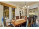 Bright dining room featuring a large table and view to backyard at 8787 E Lost Gold Cir, Gold Canyon, AZ 85118