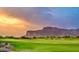 Golf course with scenic mountain views at sunset at 8787 E Lost Gold Cir, Gold Canyon, AZ 85118