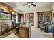 Spacious home office with built-in bookshelves and desk at 8787 E Lost Gold Cir, Gold Canyon, AZ 85118