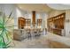 Gourmet kitchen featuring custom wood cabinetry and granite counters at 8787 E Lost Gold Cir, Gold Canyon, AZ 85118