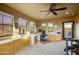 Bright home office with built-in cabinetry and mountain views at 8787 E Lost Gold Cir, Gold Canyon, AZ 85118