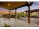 Covered patio with mountain views and dining area at 8787 E Lost Gold Cir, Gold Canyon, AZ 85118