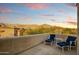 Spacious patio with comfortable seating and mountain views at 8787 E Lost Gold Cir, Gold Canyon, AZ 85118