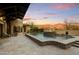 Luxury backyard oasis with a stunning pool, fountain, and mountain views at 8787 E Lost Gold Cir, Gold Canyon, AZ 85118