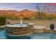 Stone spa with a fountain and mountain views at 8787 E Lost Gold Cir, Gold Canyon, AZ 85118