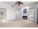 Bedroom with fireplace and private balcony access at 902 W Glendale Ave # 203, Phoenix, AZ 85021