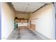 Storage area in garage with shelving for various items at 902 W Glendale Ave # 203, Phoenix, AZ 85021