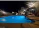 Relaxing nighttime view of the community pool at 902 W Glendale Ave # 203, Phoenix, AZ 85021