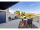 Spacious rooftop deck with seating area and city views at 902 W Glendale Ave # 203, Phoenix, AZ 85021