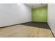 Racquetball court with green and white walls, and wood floor at 902 W Glendale Ave # 203, Phoenix, AZ 85021