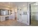 Modern bathroom with walk-in shower, separate vanities and ample closet space at 910 E Canyon Way, Chandler, AZ 85249