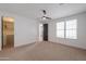 Bright bedroom with double window and walk-in closet at 910 E Canyon Way, Chandler, AZ 85249