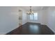 Spacious dining area featuring hardwood floors and a chandelier at 910 E Canyon Way, Chandler, AZ 85249