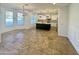 Open kitchen with large island, granite counters and tile floors at 910 E Canyon Way, Chandler, AZ 85249