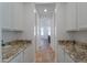 Walk-in pantry with granite countertops and shelving at 910 E Canyon Way, Chandler, AZ 85249