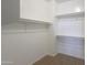 Large walk-in closet with ample shelving and hanging space at 910 E Canyon Way, Chandler, AZ 85249