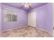 Light purple bedroom with tile floors and window coverings at 9233 E Lobo Ave, Mesa, AZ 85209