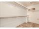 Large walk-in closet with shelving and hanging rods at 9233 E Lobo Ave, Mesa, AZ 85209