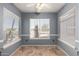 Bright dining area with tile flooring and window views at 9233 E Lobo Ave, Mesa, AZ 85209