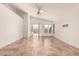 Living room with tile floors and access to the backyard at 9233 E Lobo Ave, Mesa, AZ 85209