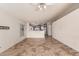 Bright living room with tile flooring and kitchen views at 9233 E Lobo Ave, Mesa, AZ 85209