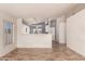 View of living room, kitchen, and tile flooring at 9233 E Lobo Ave, Mesa, AZ 85209