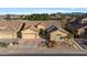 Aerial view of house and neighborhood, showcasing the surrounding community at 9758 E Meseto Ave, Mesa, AZ 85209