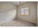 Bedroom with ceiling fan and window with blinds at 9758 E Meseto Ave, Mesa, AZ 85209