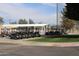 Golf carts parked neatly near the clubhouse at 9758 E Meseto Ave, Mesa, AZ 85209