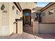 Inviting house entrance with a terracotta-tiled walkway at 9758 E Meseto Ave, Mesa, AZ 85209