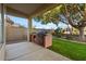 Patio with built-in grill and backyard access at 9758 E Meseto Ave, Mesa, AZ 85209