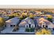 Aerial view of a single-Gathering home and surrounding houses at 14732 W Edgemont Ave, Goodyear, AZ 85395