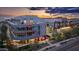 Aerial view of modern building at sunset with parking at 16510 N 92Nd St # 1003, Scottsdale, AZ 85260