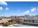 Aerial view of a modern building complex with mountain backdrop at 16510 N 92Nd St # 1003, Scottsdale, AZ 85260