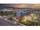 Aerial view of modern building at sunset with street view at 16510 N 92Nd St # 1003, Scottsdale, AZ 85260