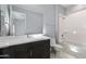 Bathroom with tub, toilet and modern vanity at 16510 N 92Nd St # 1003, Scottsdale, AZ 85260
