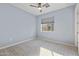 Bright bedroom with carpet flooring and a window offering natural light at 16510 N 92Nd St # 1003, Scottsdale, AZ 85260