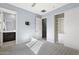 Bedroom with carpet flooring and closet at 16510 N 92Nd St # 1003, Scottsdale, AZ 85260