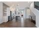 Open concept kitchen with island and modern chandelier at 16510 N 92Nd St # 1003, Scottsdale, AZ 85260