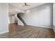 Bright living room with hardwood floors and modern staircase at 16510 N 92Nd St # 1003, Scottsdale, AZ 85260